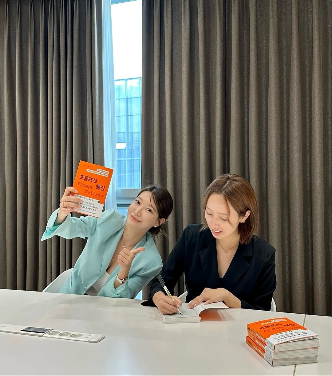 Photo shared by 이해인 | 해니크 on November 02, 2025 tagging @lo_sajang_. May be an image of one or more people, suit, book and text.