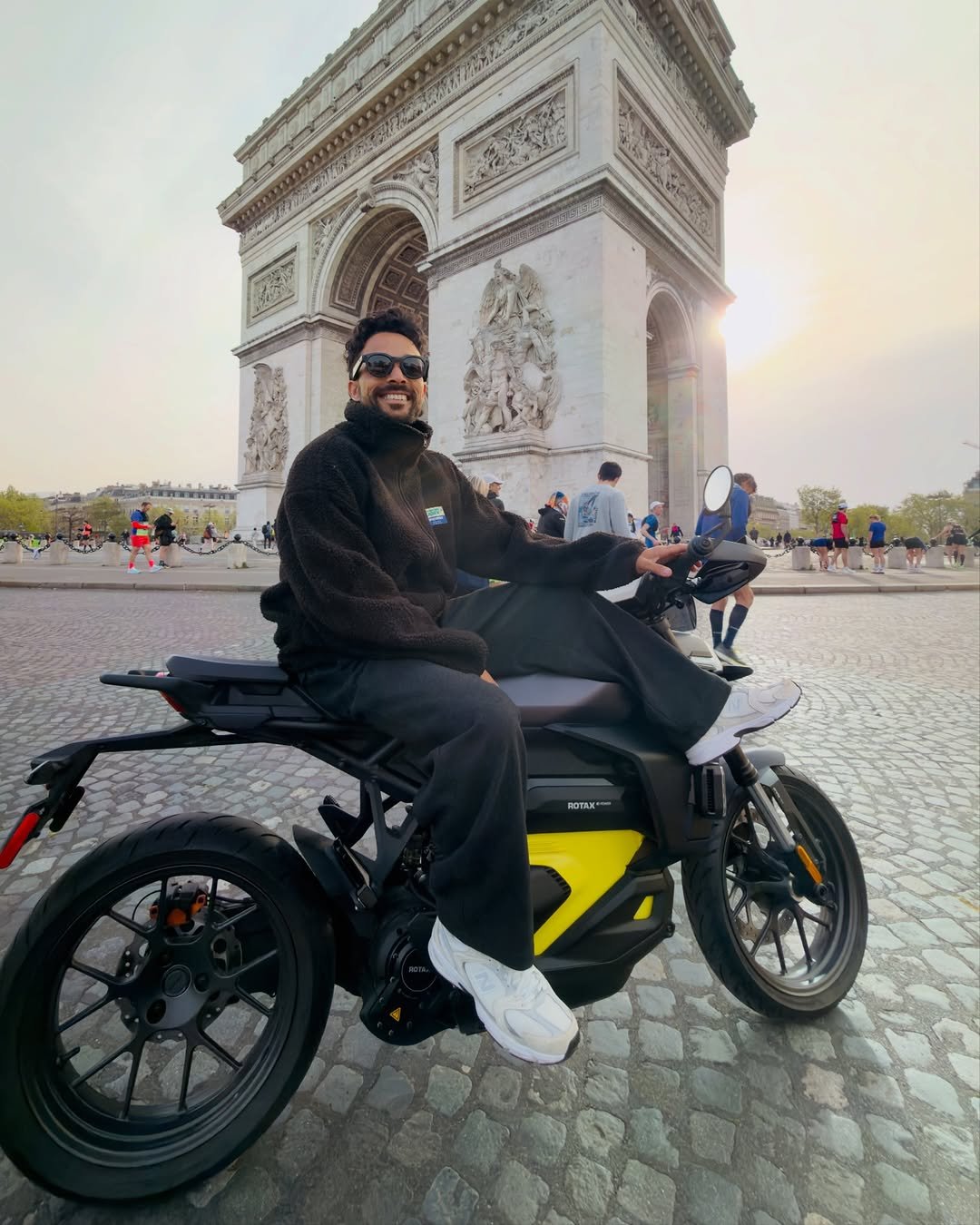 Photo shared by Lotfi Lamaali on April 15, 2026 tagging @canammotorcycles. May be an image of motorcycle, scooter, Sacré-Cœur, the Arc de Triomphe and text.