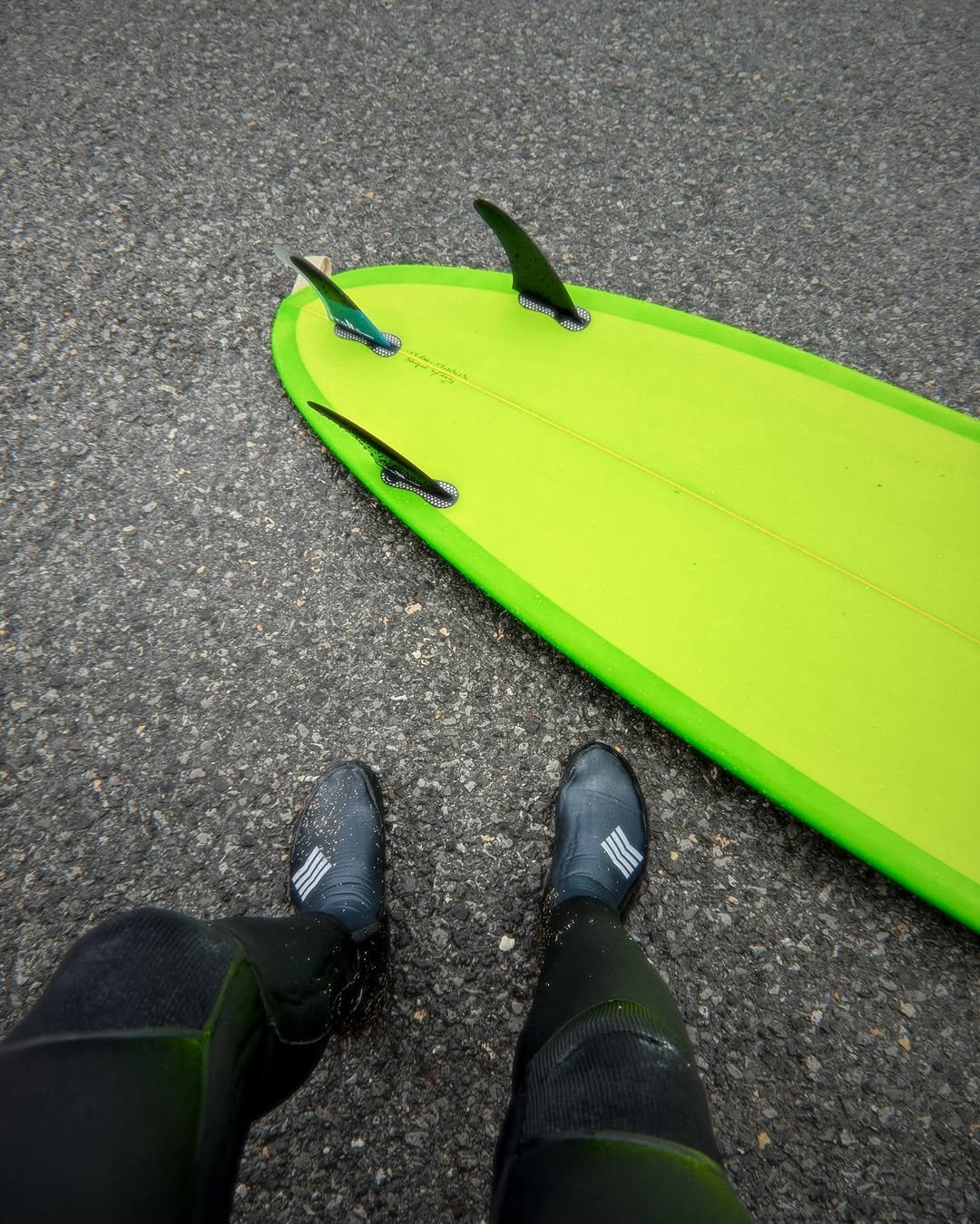 Photo by Lotfi Lamaali on February 18, 2026. May be an image of surfboard, wetsuit and text.