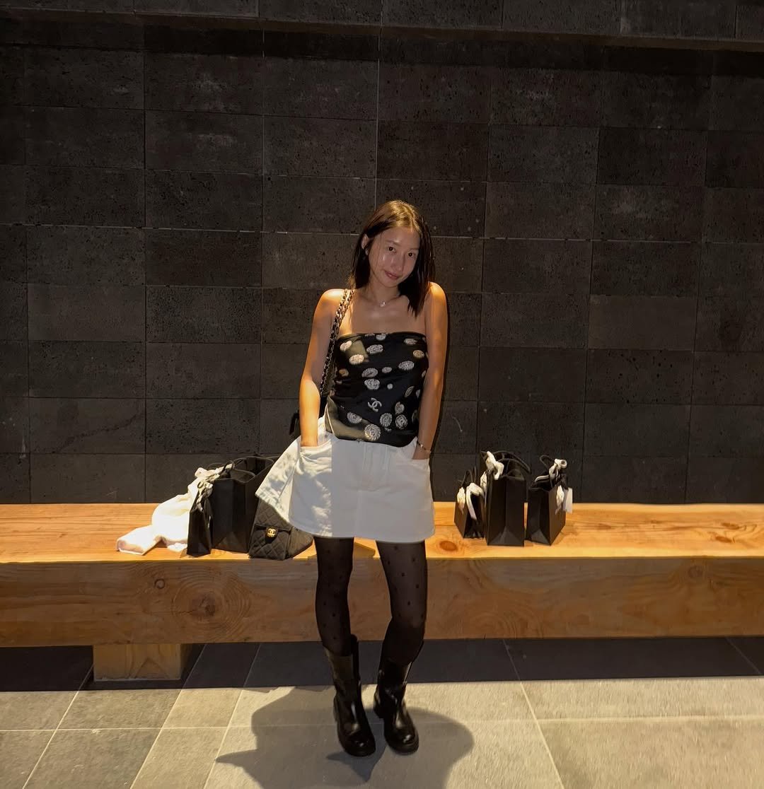 Photo by ok myeongji on September 28, 2025. May be an image of 1 person, miniskirt, kilt and text.