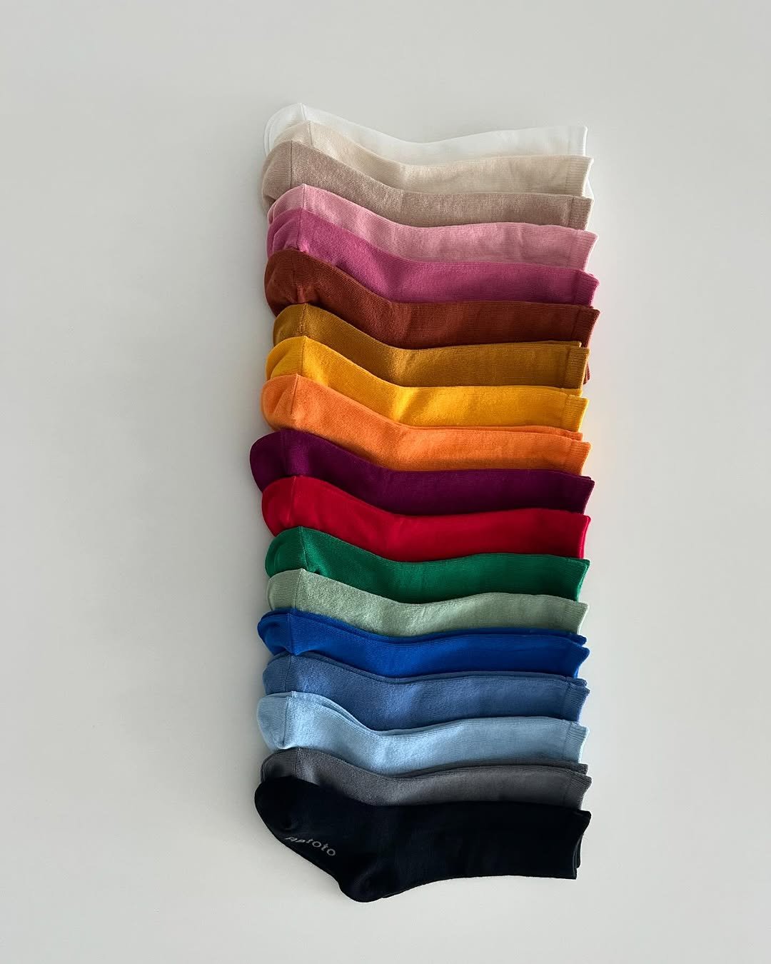 Photo by RATOTO/자체제작 on September 25, 2025. May be an image of sock and text.