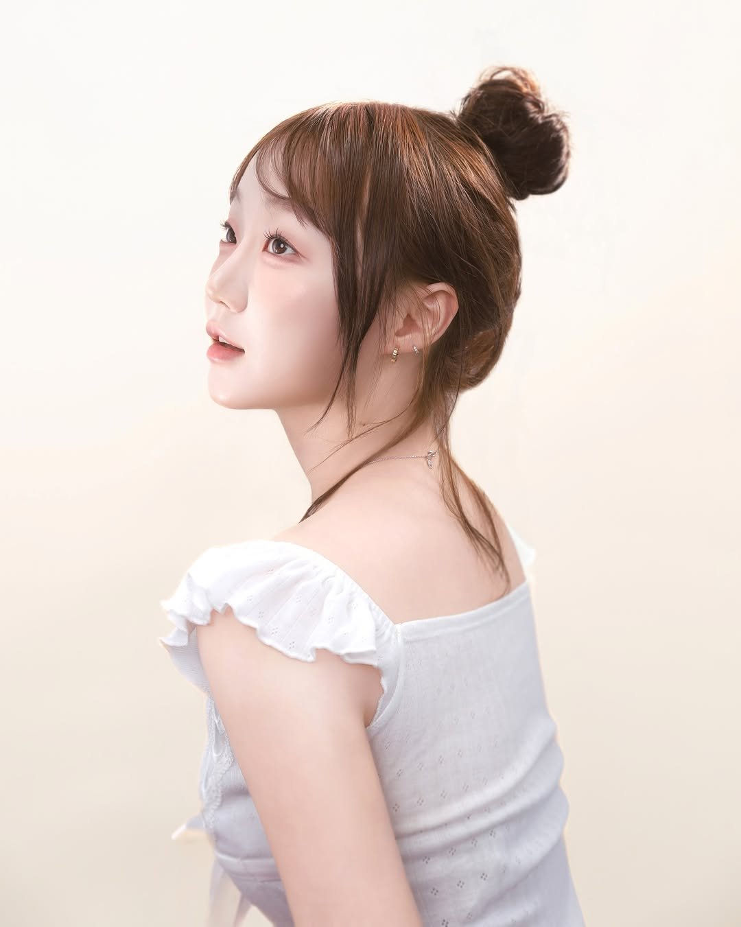 Photo shared by 강예빈 on January 24, 2026 tagging @asle_loves.u, and @asle_films.u. May be an image of one or more people, braids, makeup and text.