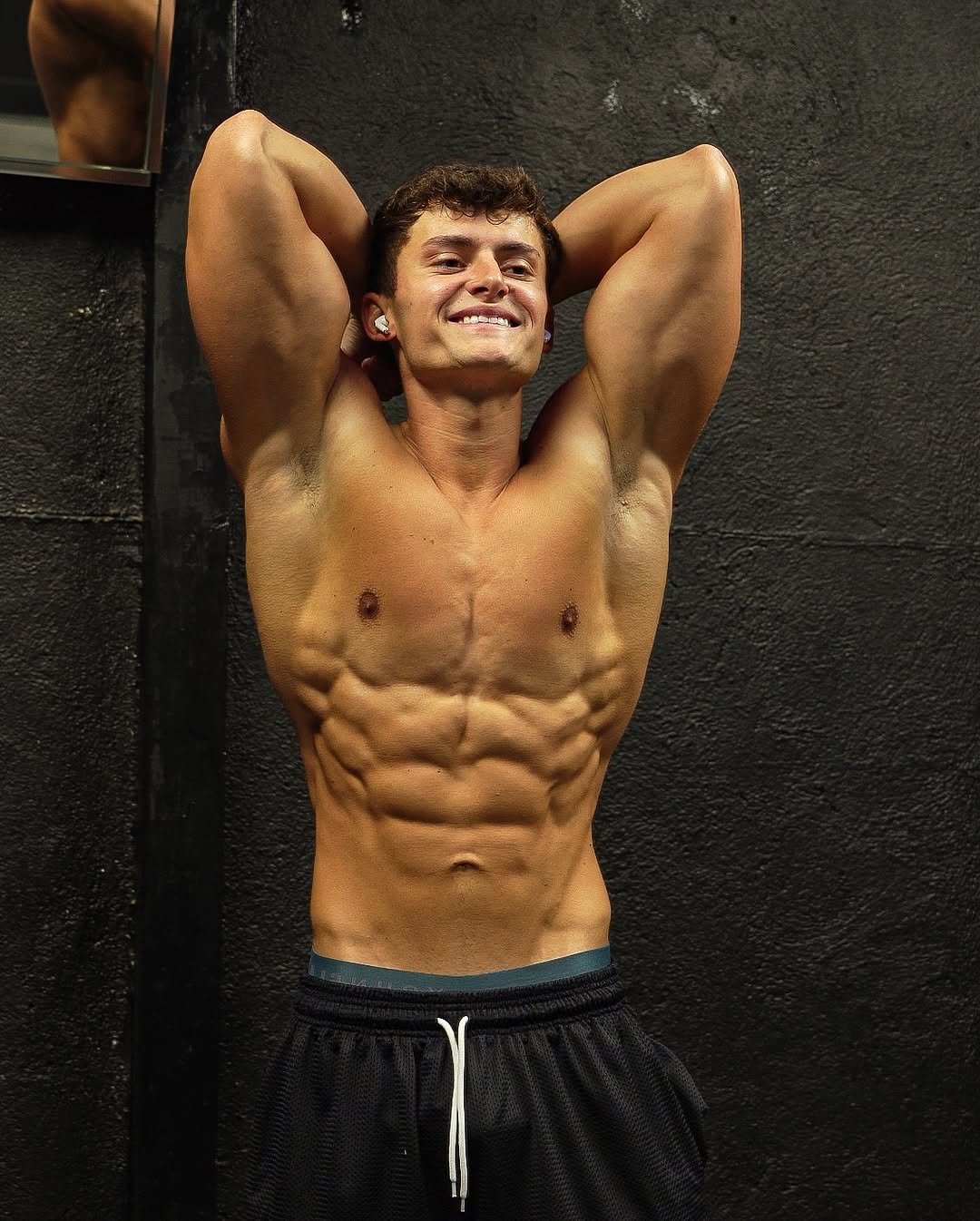 Photo by Lucas Popan on October 09, 2025. May be an image of 1 person, biceps, body building and text.