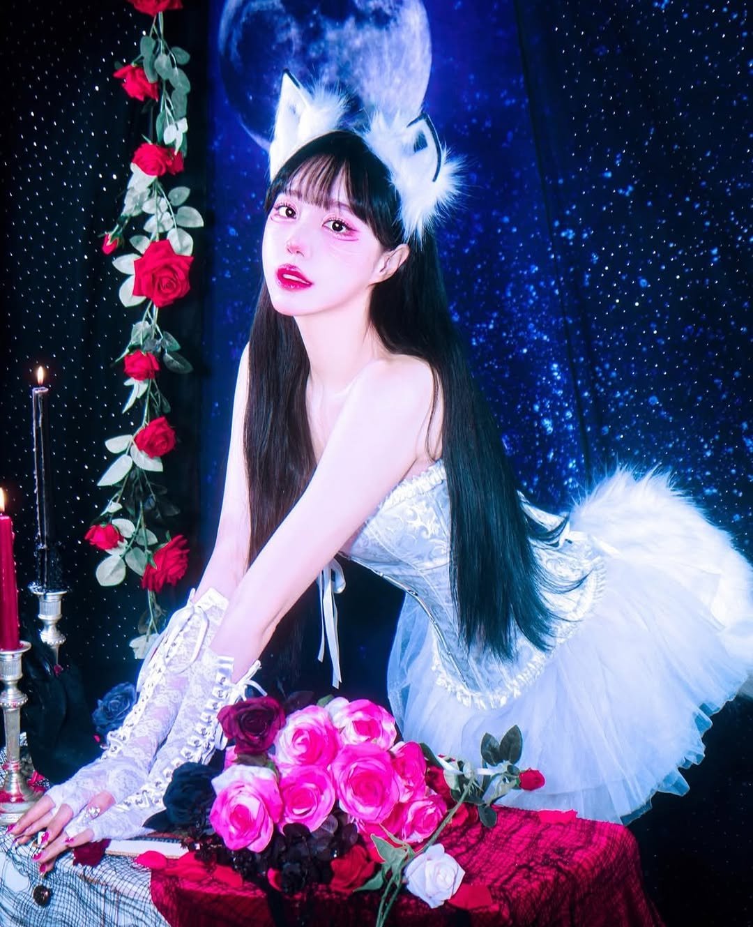 Photo by 럭키비키랜드 on October 31, 2025. May be an image of one or more people, makeup, hair, headdress, costume, dress and text.