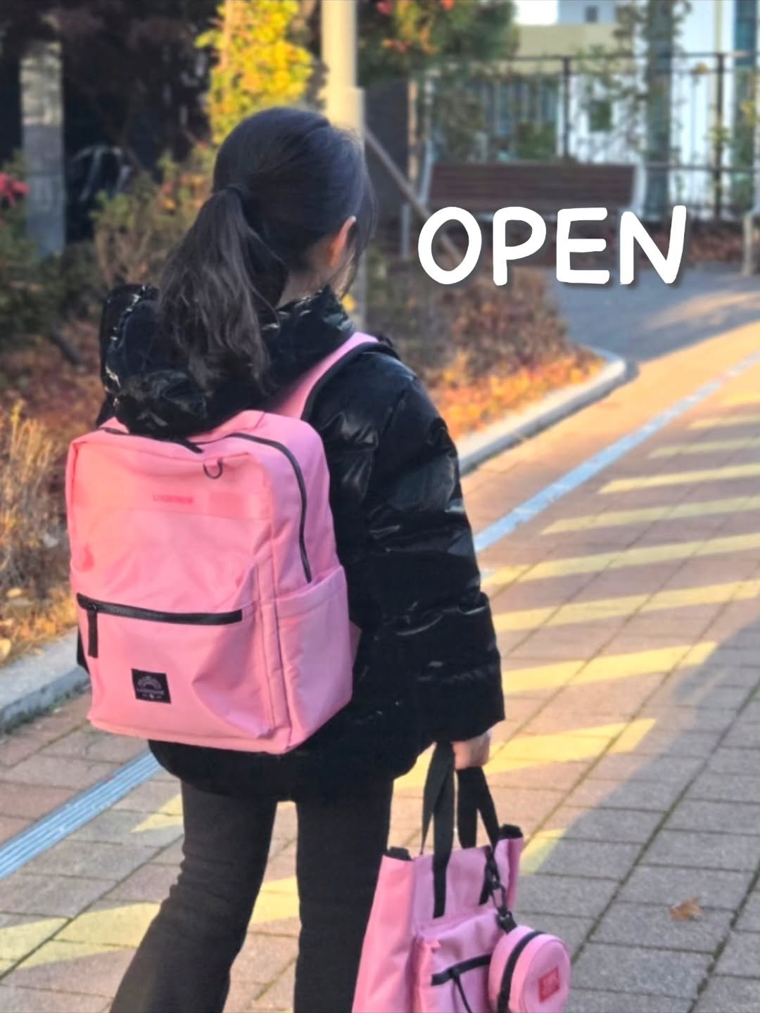 Photo by 루미하루 on January 20, 2026. May be an image of duffle coat, sling and text that says 'OPEN'.
