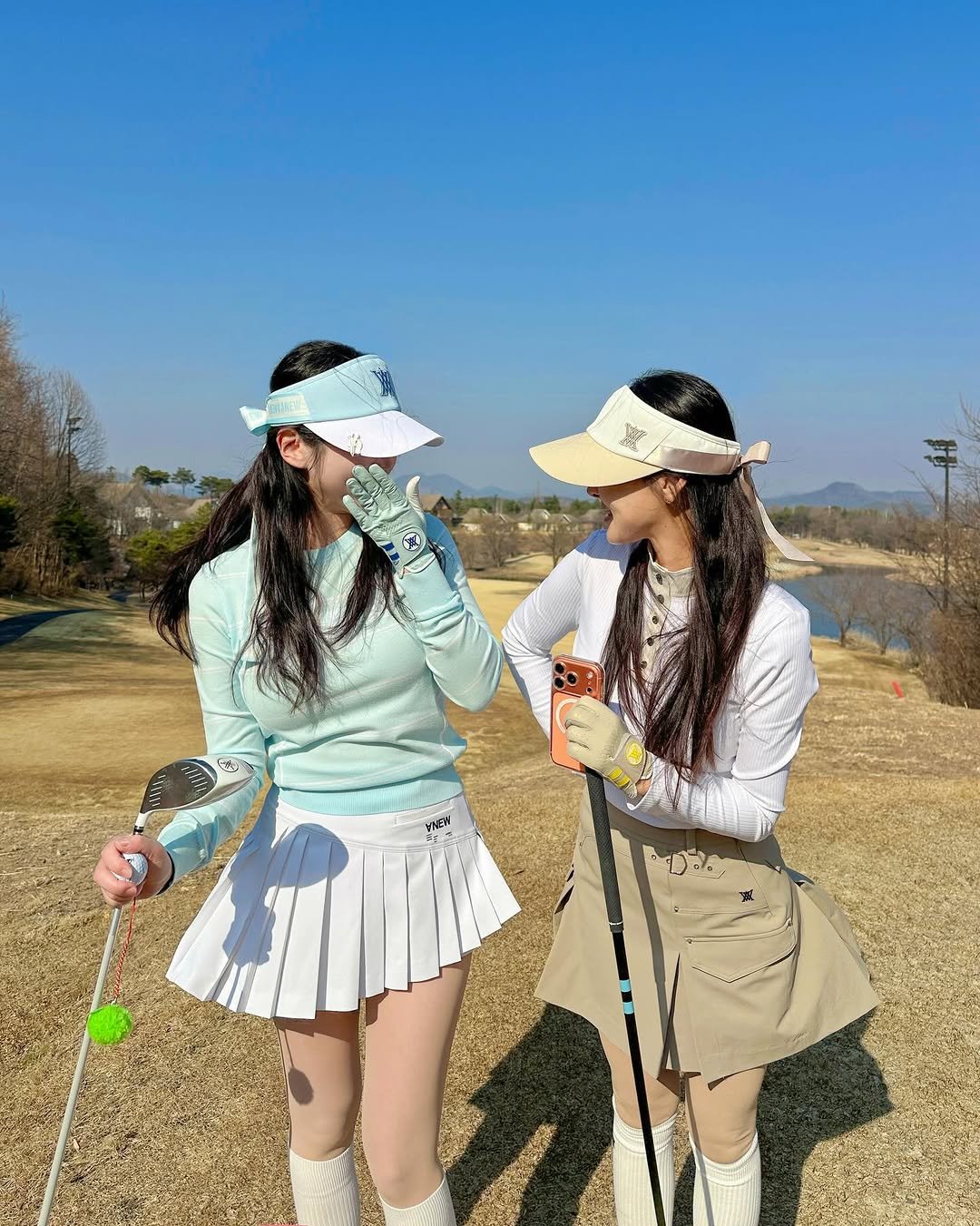 Photo shared by Yeonjoo shin on February 25, 2026 tagging @anewgolf_official, @anewgolf_fashion, and @lue_golf. May be an image of golf, miniskirt, outdoors and text.