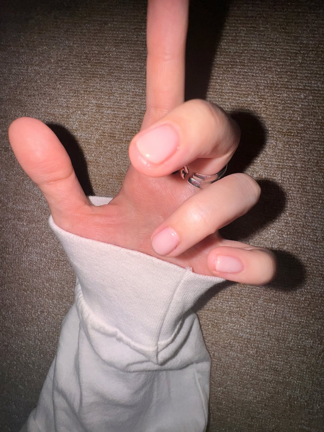 Photo shared by @제영 on September 09, 2025 tagging @oneu.nail. May be an image of one or more people, fingernails, bandage and text.