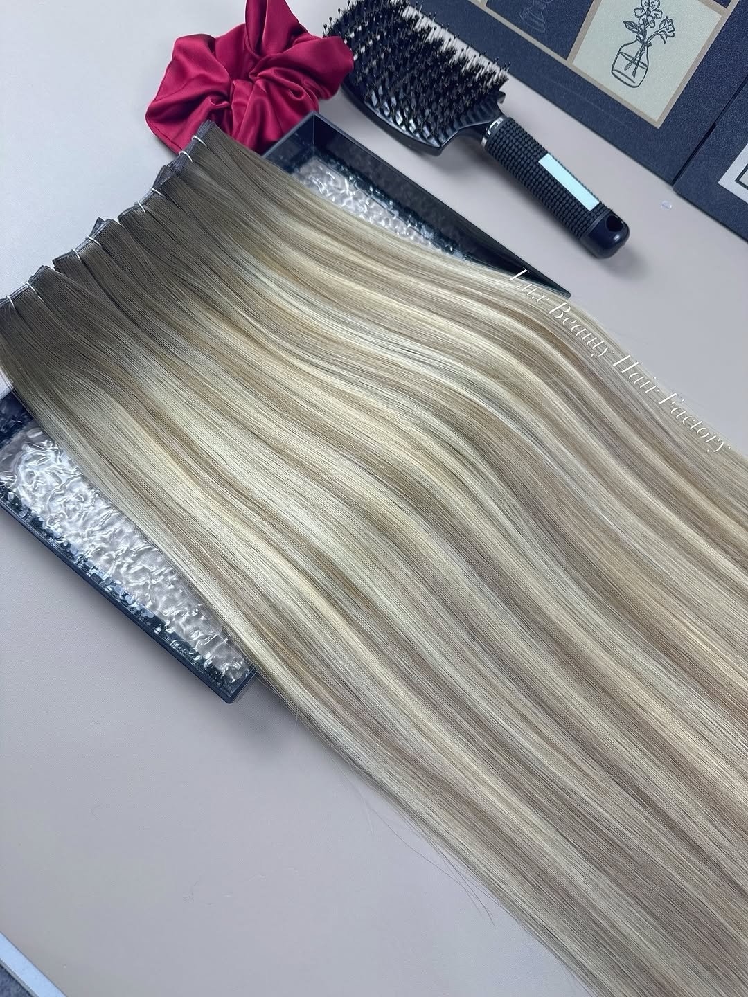 Photo by Hair manufacturer|Kertain| Wefts| Tapeins|Halo hair| Toppers| on April 02, 2026. May be an image of one or more people, braids, blonde hair, long hair and text.