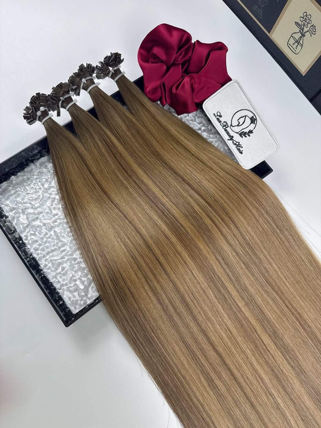 Photo by Hair manufacturer|Kertain| Wefts| Tapeins|Halo hair| Toppers| on March 26, 2026. May be an image of one or more people, blonde hair, long hair and text.