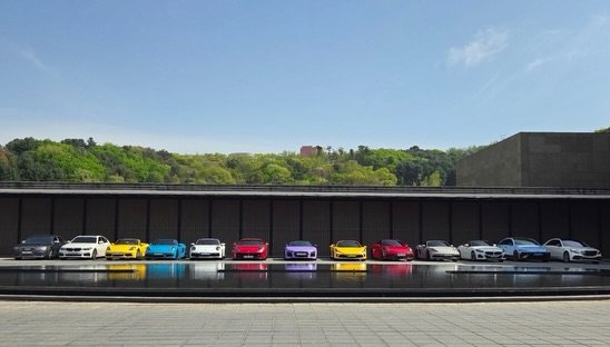 Photo by 전 정수 on April 22, 2026. May be an image of race car, sedan, road and text.