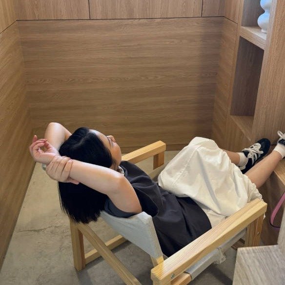 Photo by 라나 필라테스 on August 14, 2025. May be an image of 1 person, deck chair, chaise lounge and text.