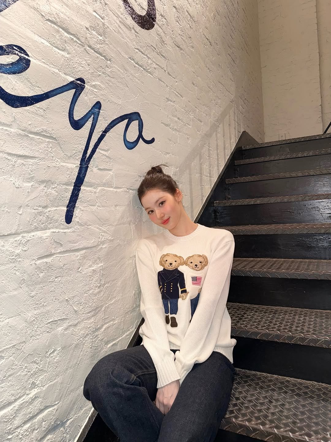 Photo shared by 사나 𝚂𝚊𝚗𝚊 on March 30, 2026 tagging @poloralphlauren. May be an image of sweatshirt and text.
