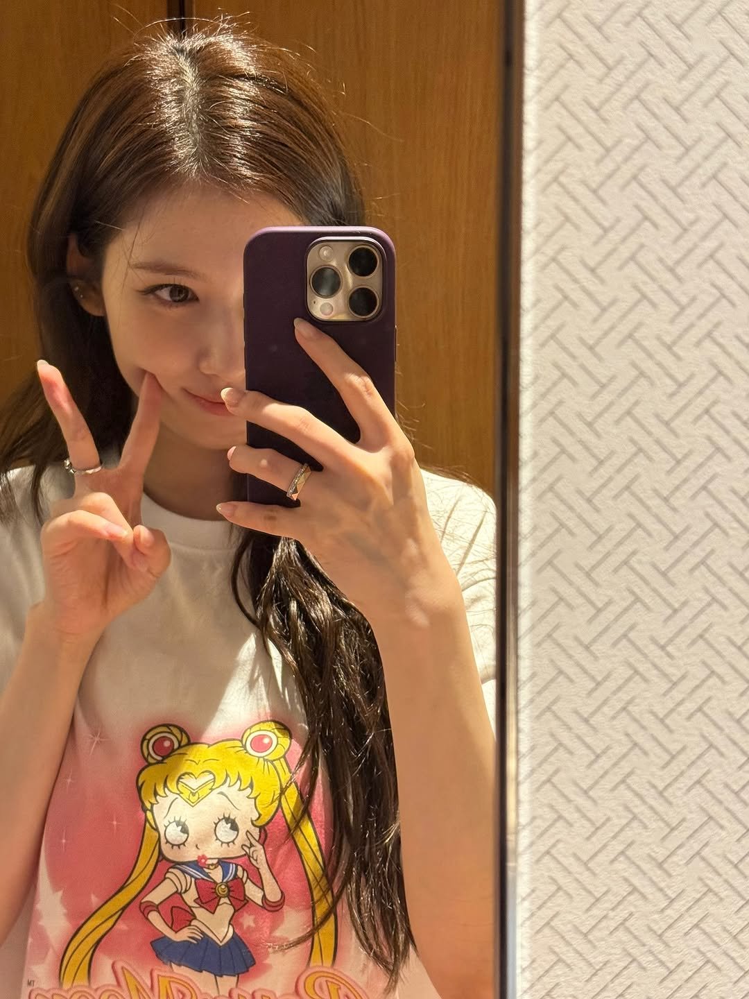 Photo by 사나 𝚂𝚊𝚗𝚊 on August 26, 2025. May be a selfie of 1 person, hair, phone, top, mirror and text.