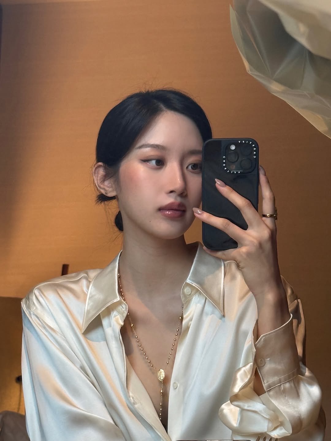 Photo by MUN KA YOUNG on October 01, 2025. May be a selfie of 1 person, makeup, hair, slip, sleepwear, phone, bath robe and text.