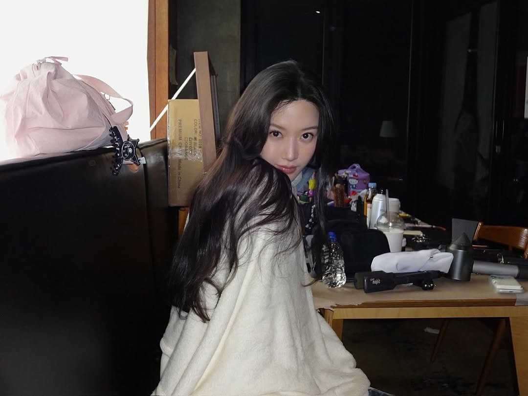 Photo by MUN KA YOUNG on April 13, 2026. May be an image of one or more people, braids, makeup, bath robe and text.