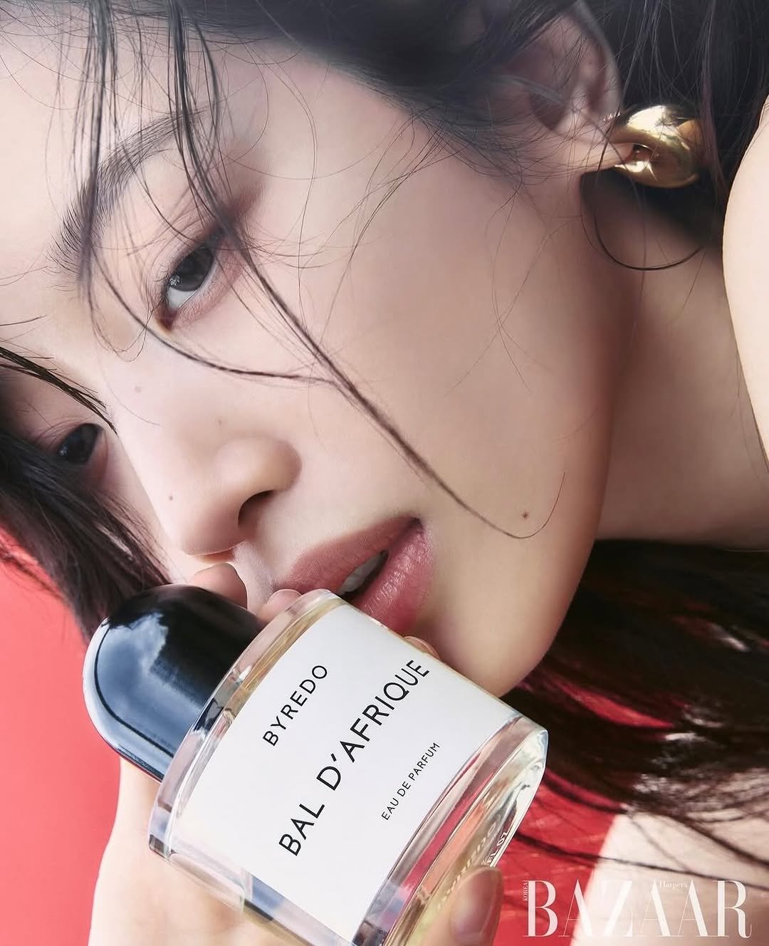 Photo shared by MUN KA YOUNG on April 16, 2026 tagging @officialbyredo, @bkimdesign, and @jxw. May be an image of one or more people, makeup, fragrance, perfume, hand cream and text that says 'BYREDO BYREDO D'AFRIQUE D' RIQUE PARFUM DE BAL EAU BYZAAR'.