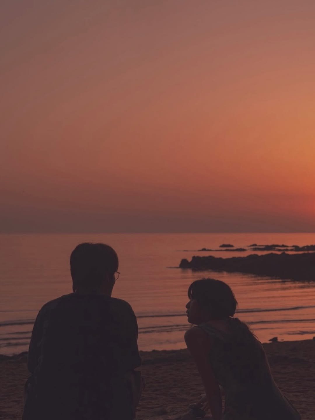 Photo by MUN KA YOUNG on January 22, 2026. May be an image of one or more people, ocean, beach, horizon, twilight and text.