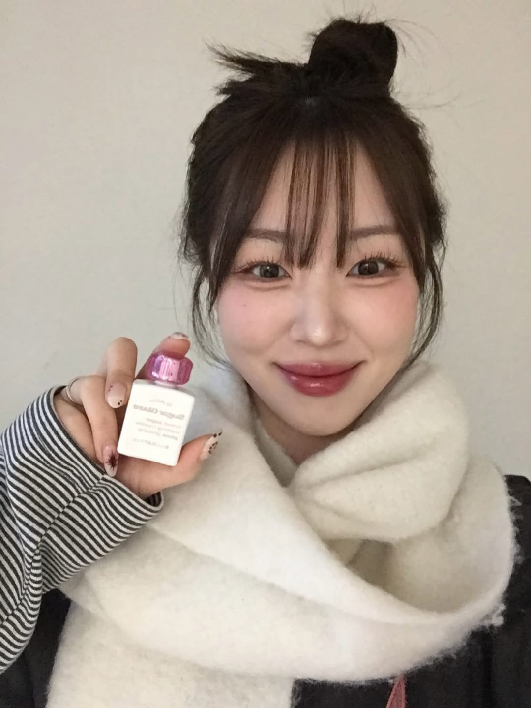 Photo shared by 말랑 on December 07, 2025 tagging @alternativestereo. May be an image of one or more people, lipstick, makeup, perfume and hand cream.