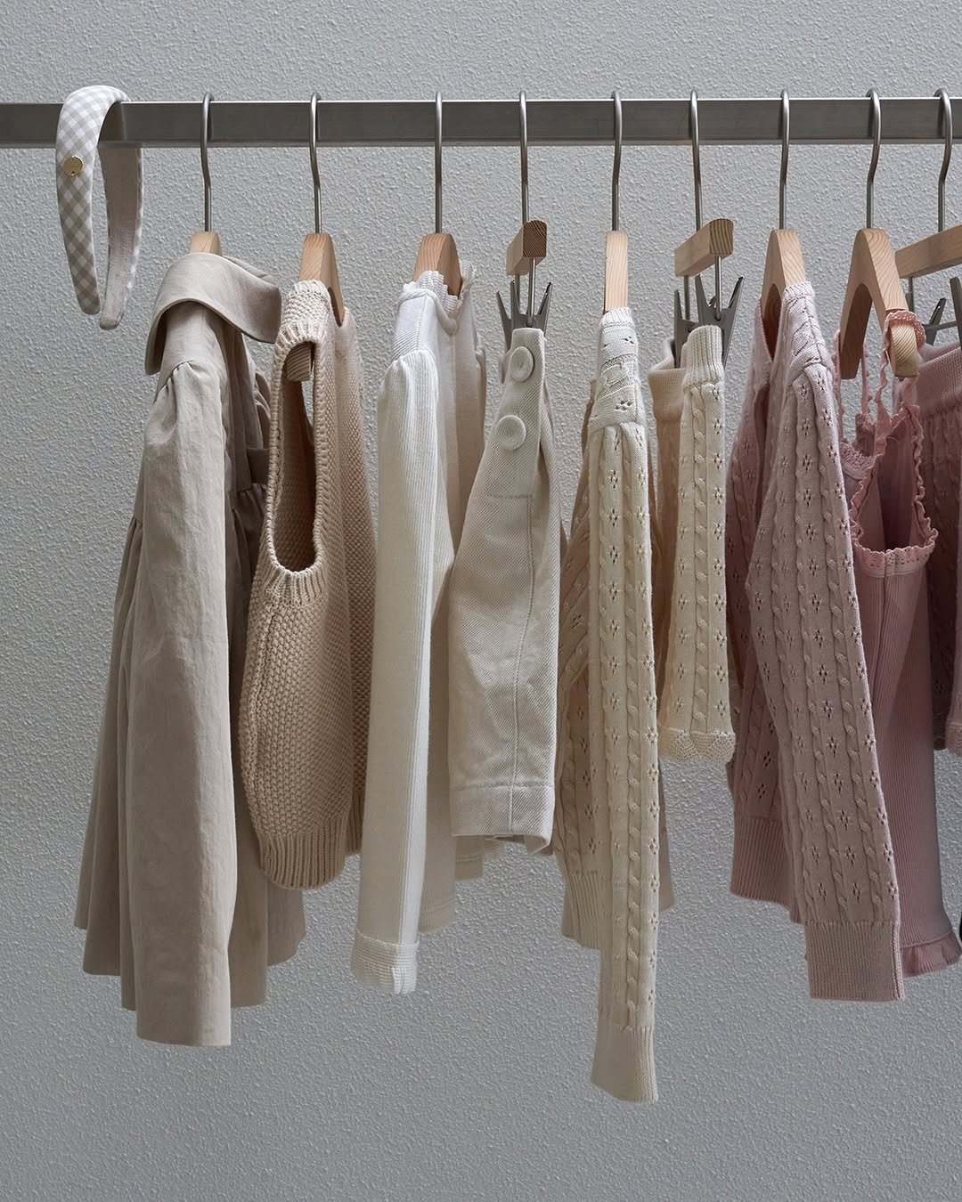 Photo by 마망블랑 mamanblanc on February 19, 2026. May be an image of clothes hanger, rack and text.