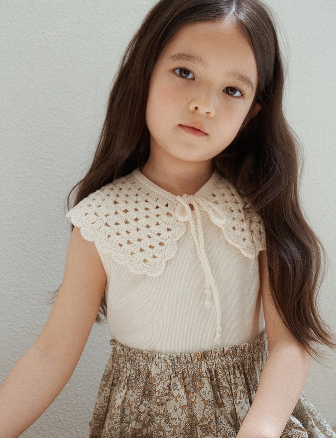 Photo by 마망블랑 mamanblanc on April 22, 2026. May be an image of child, lace and text.