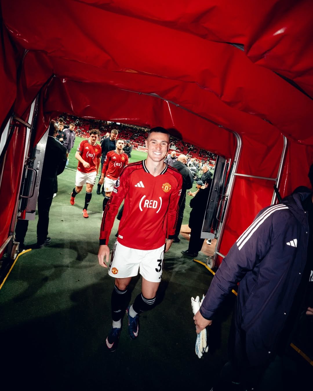 Photo shared by Manchester United on April 27, 2026 tagging @weareunited. May be an image of football, soccer, crowd, stadium and text that says '（起） (RED)'.