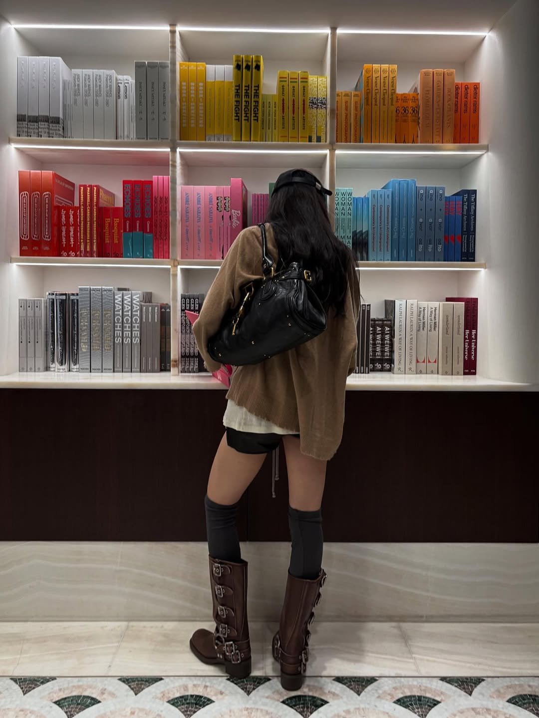 Photo by sonnaeun on September 22, 2025. May be an image of boots, leather, book and indoors.