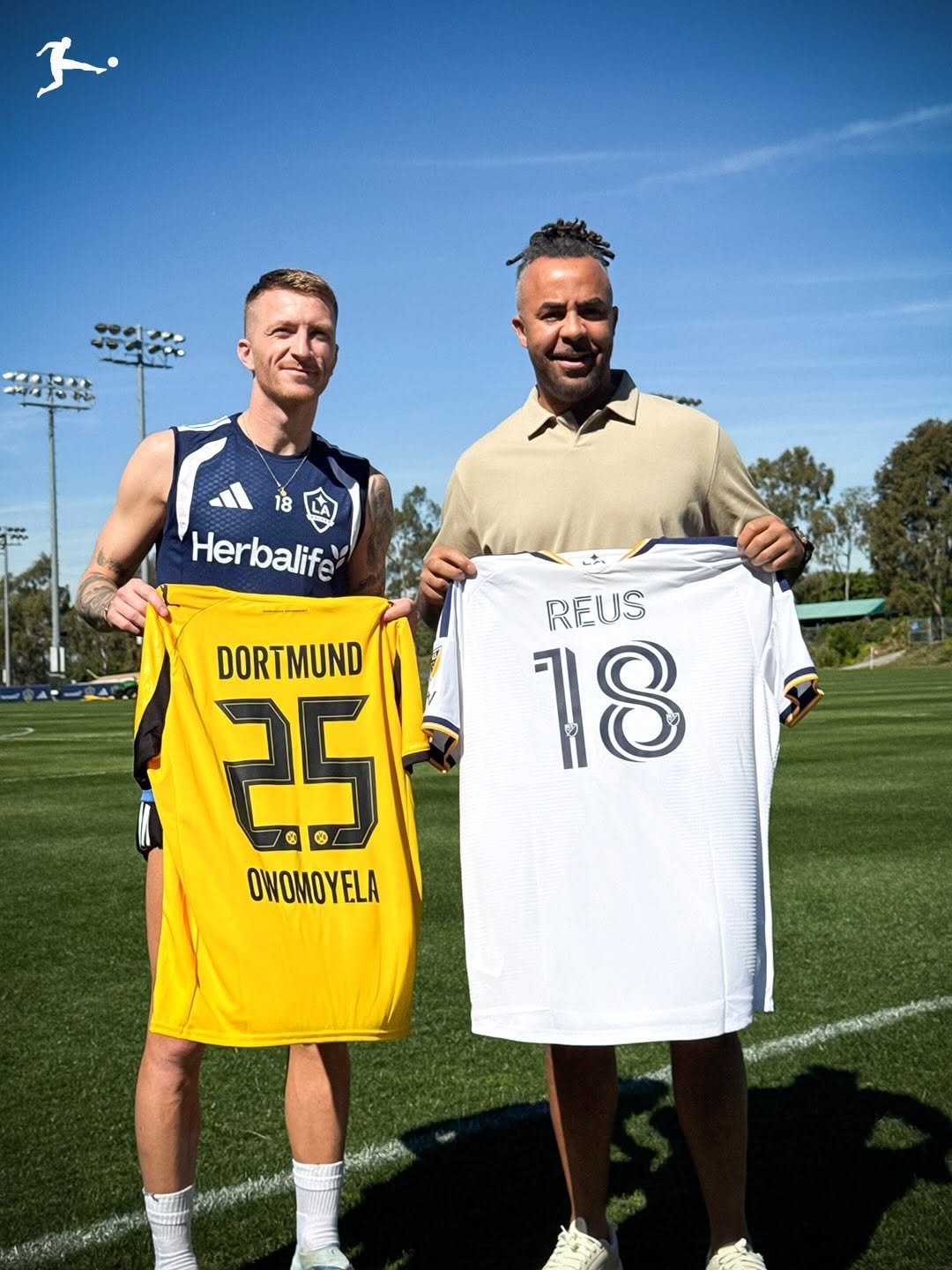 Photo shared by Bundesliga on February 27, 2026 tagging @marcinho11, @owomuck, and @blackyellow. May be an image of football, soccer, sports equipment, sportswear, stadium and text that says '18 Herbalife REUS 18 DORTMUND 25 OWOMOYELA আবি'.