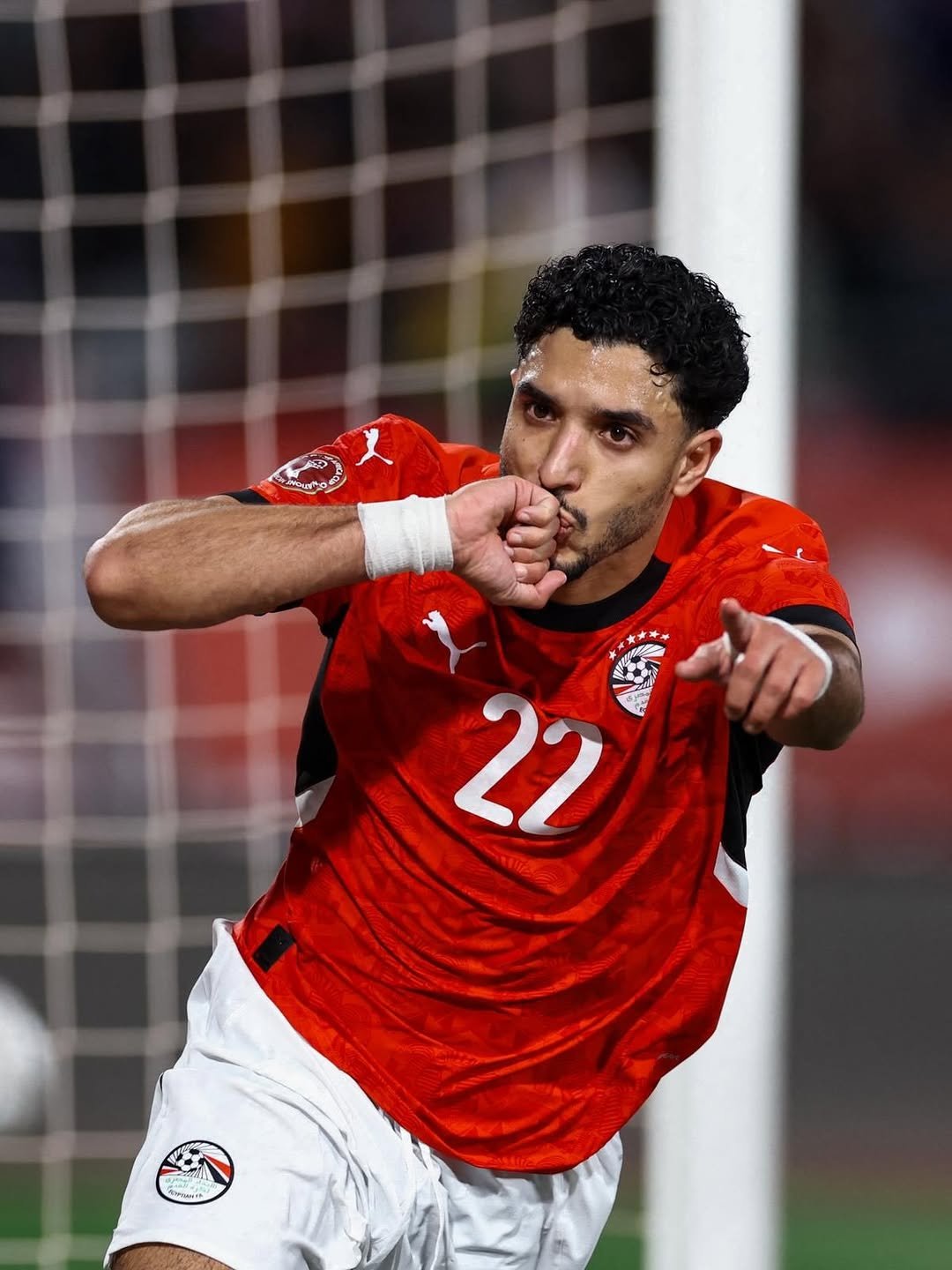 Photo by Omar Marmoush on December 22, 2025. May be an image of football, soccer, ball, stadium and text.