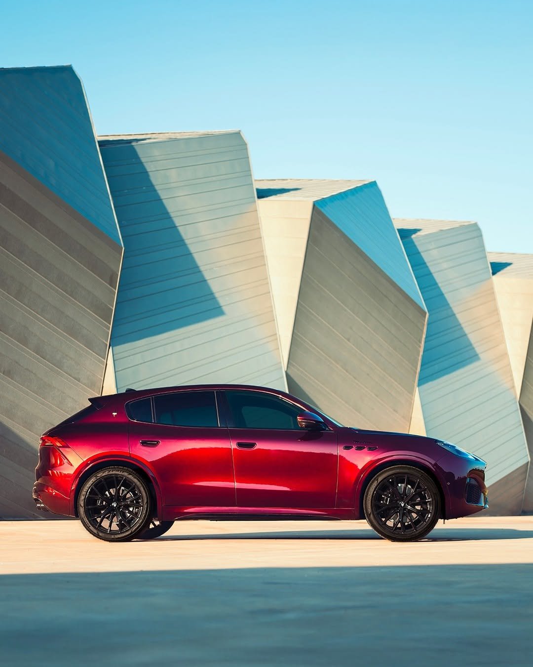 Photo by Maserati on October 27, 2025. May be an image of wheel, sedan, road and text.