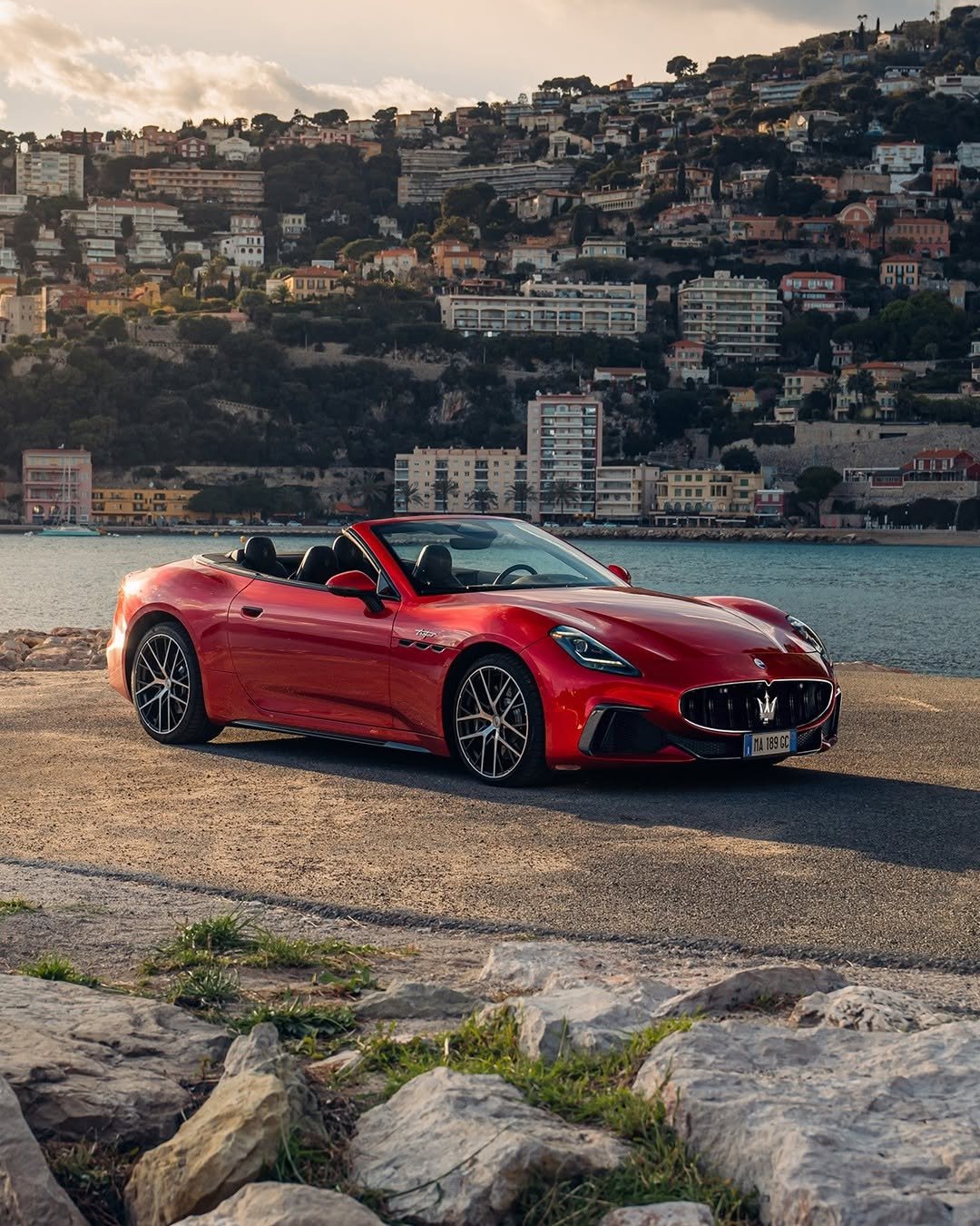 Photo by Maserati on April 17, 2026. May be an image of car, convertible, roadster, wheel, road and text.