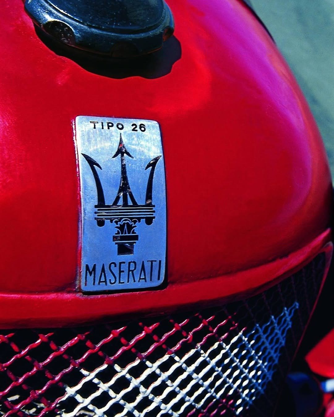 Photo shared by Maserati on April 24, 2026 tagging @maseraticorse. May be an image of racing vehicles, helmet, scooter and text that says 'TIPO TIPO26 26 MASERATI'.