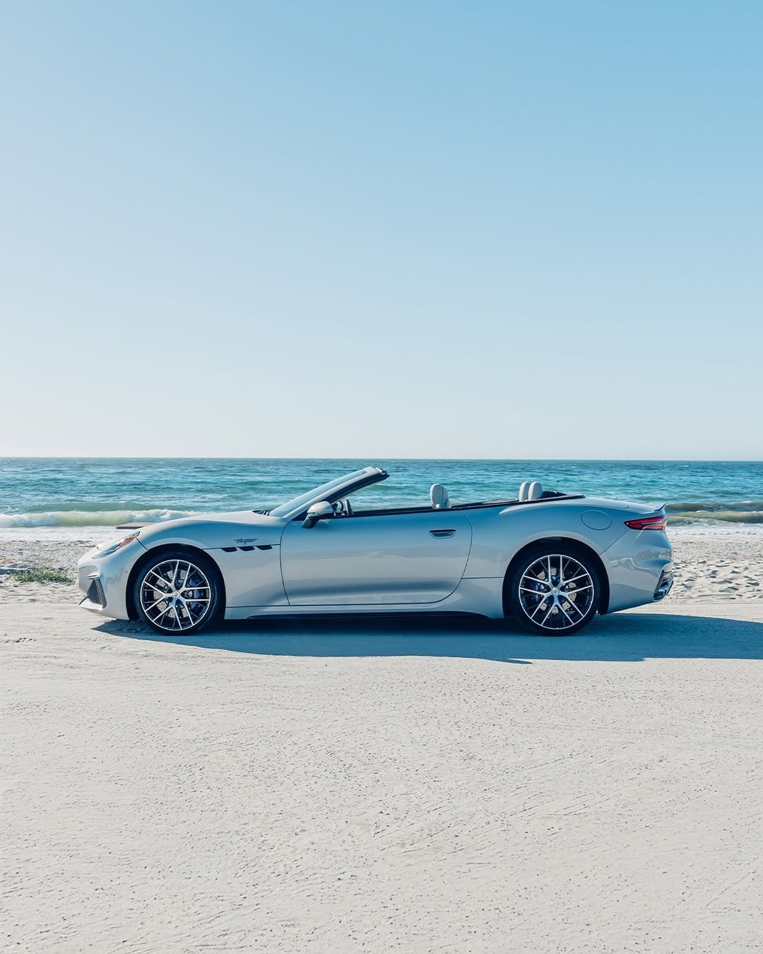 Photo by Maserati on August 25, 2025. May be an image of car, convertible, roadster, wheel, road and text.