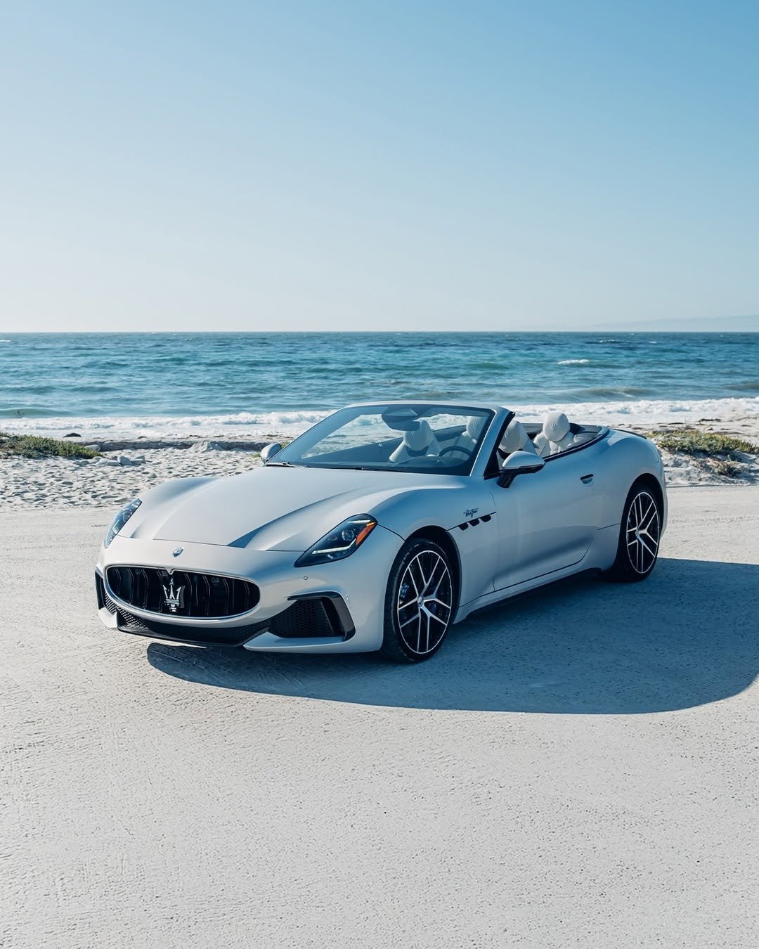 Photo by Maserati on August 27, 2025. May be an image of car, convertible, roadster, wheel, road and text.