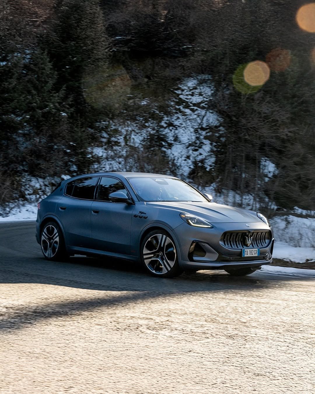 Photo by Maserati on December 10, 2025. May be an image of wheel, sedan, road and text.