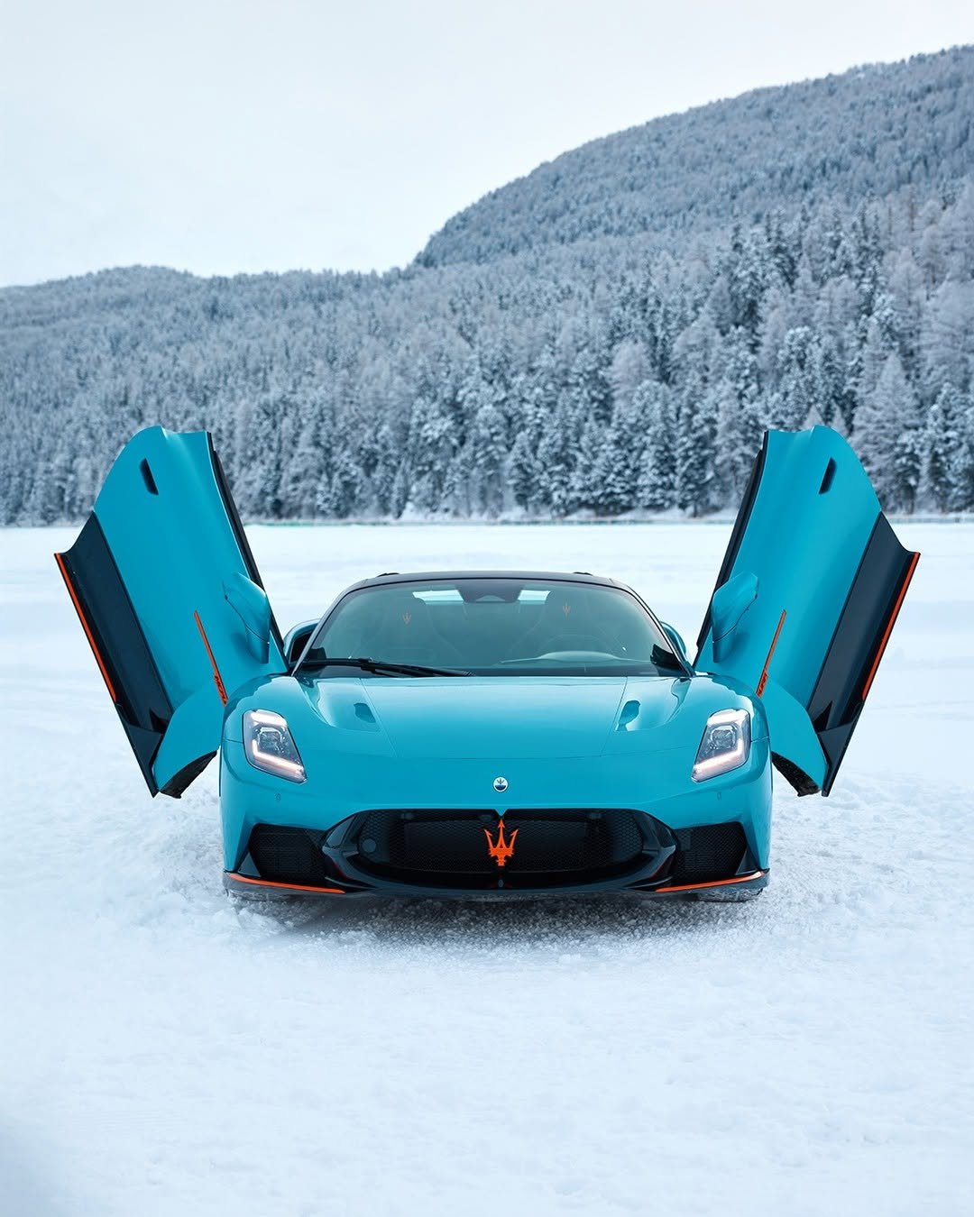 Photo by Maserati on February 20, 2026. May be an image of race car, road, snow and text.