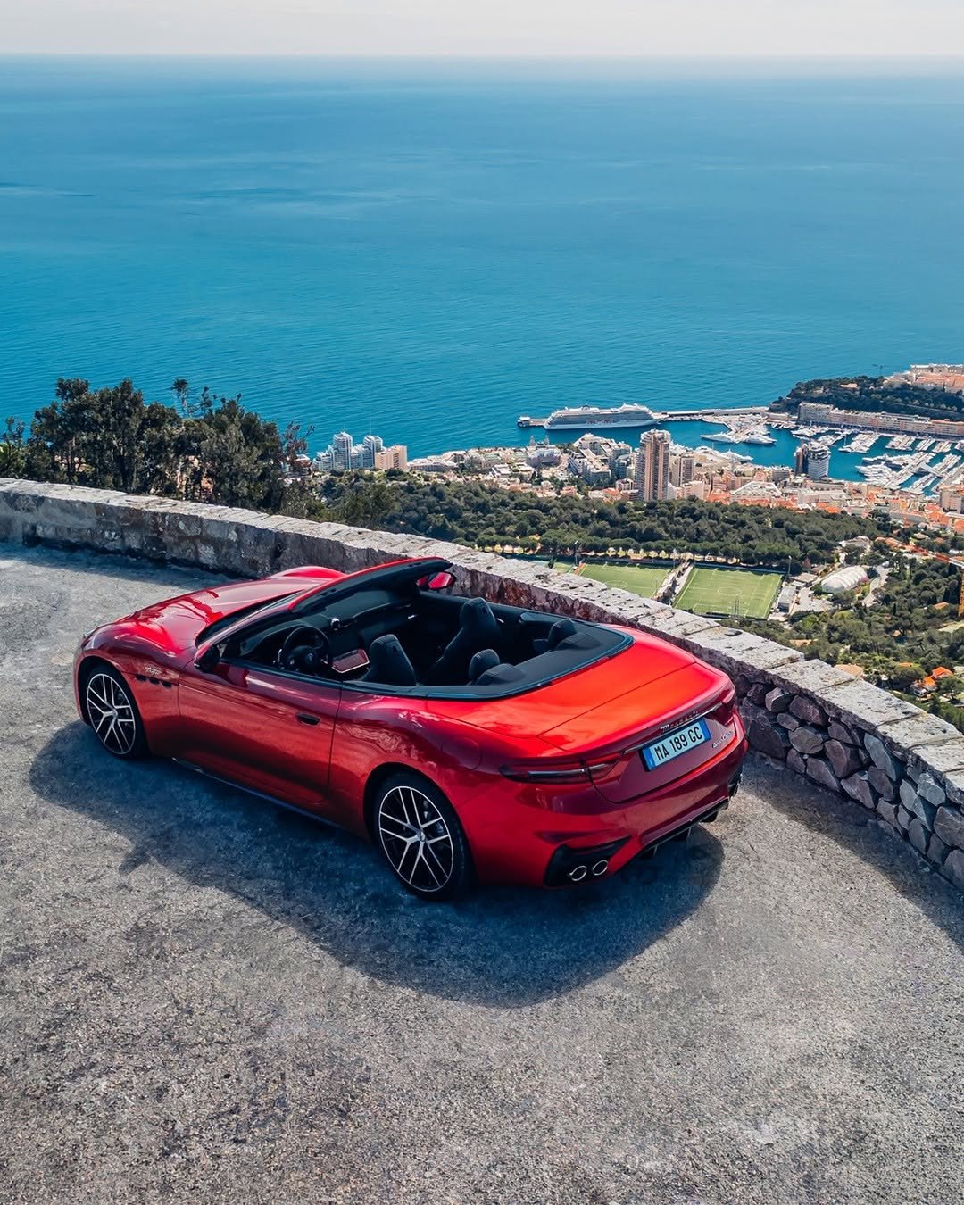 Photo by Maserati on April 06, 2026. May be an image of car, convertible, roadster, wheel, road and text that says 'ዜ MA189CC'.