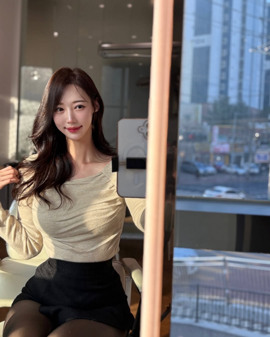 Photo shared by 은지 on December 22, 2025 tagging @id_ycd_kh. May be an image of one or more people, hair, miniskirt, top and text.