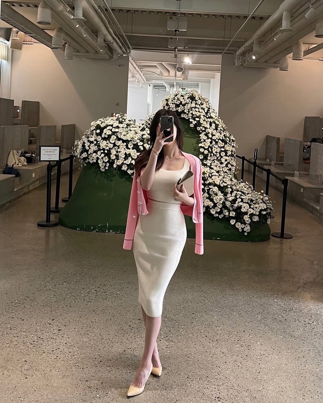 Photo shared by 라뮤제 on September 23, 2025 tagging @matilly_eunji. May be an image of 1 person, miniskirt, skirt, dress, white lily and text.