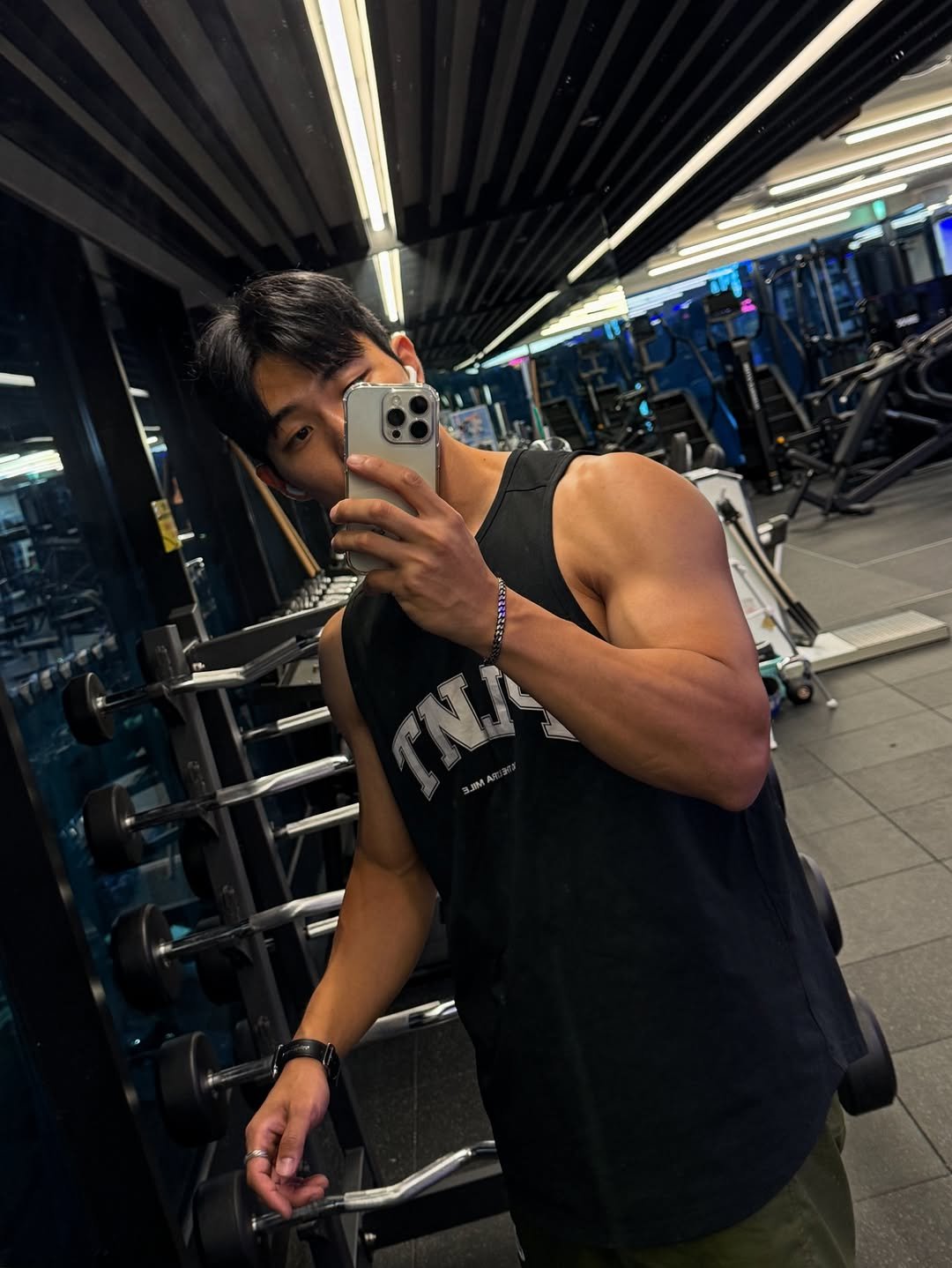 Photo by 운동 열심히 하는 사람 in Busan 釜山, South Korea. May be an image of 1 person, biceps, body building, tanktop and text.