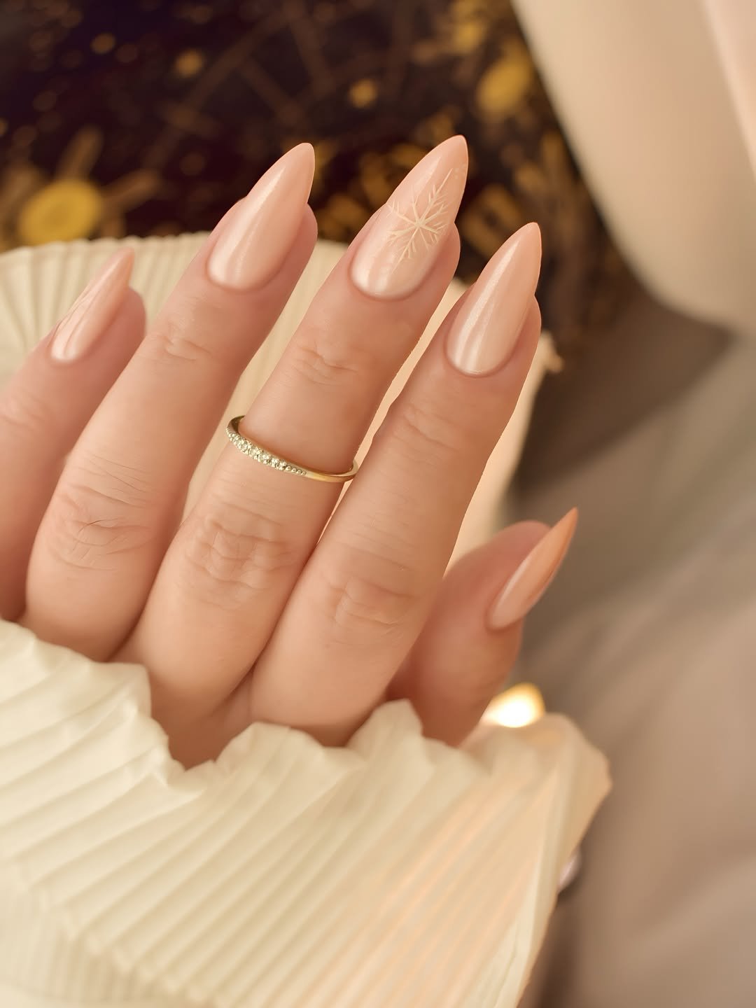 Photo by Karolina Matuszewska on November 29, 2025. May be an image of one or more people, fingernails and text.