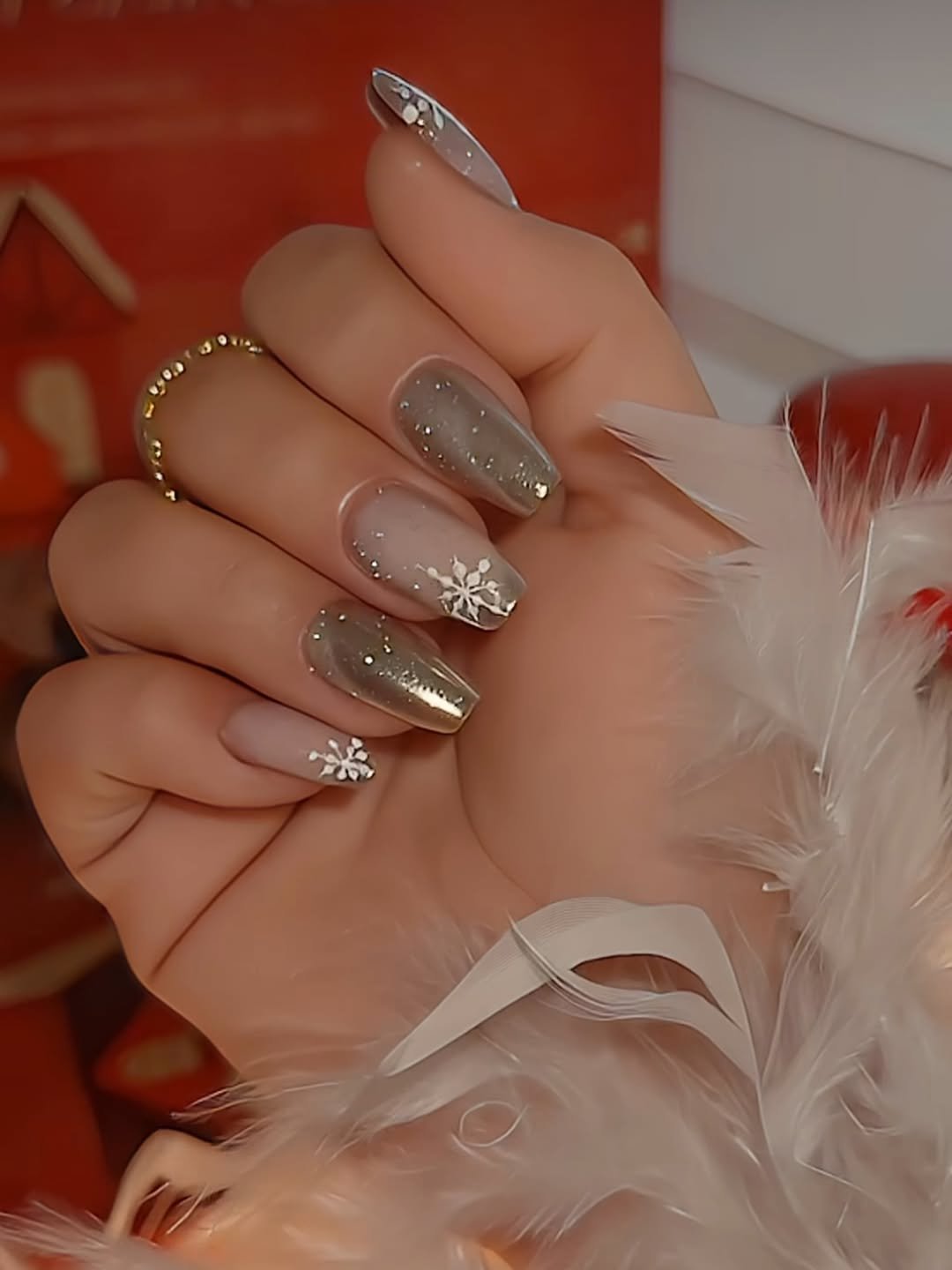 Photo by Karolina Matuszewska on December 01, 2025. May be an image of one or more people, fingernails and text.