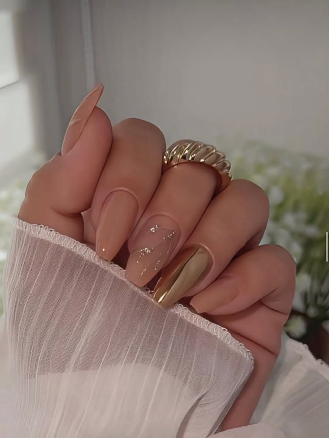 Photo by Karolina Matuszewska on November 27, 2025. May be an image of one or more people, fingernails and text.