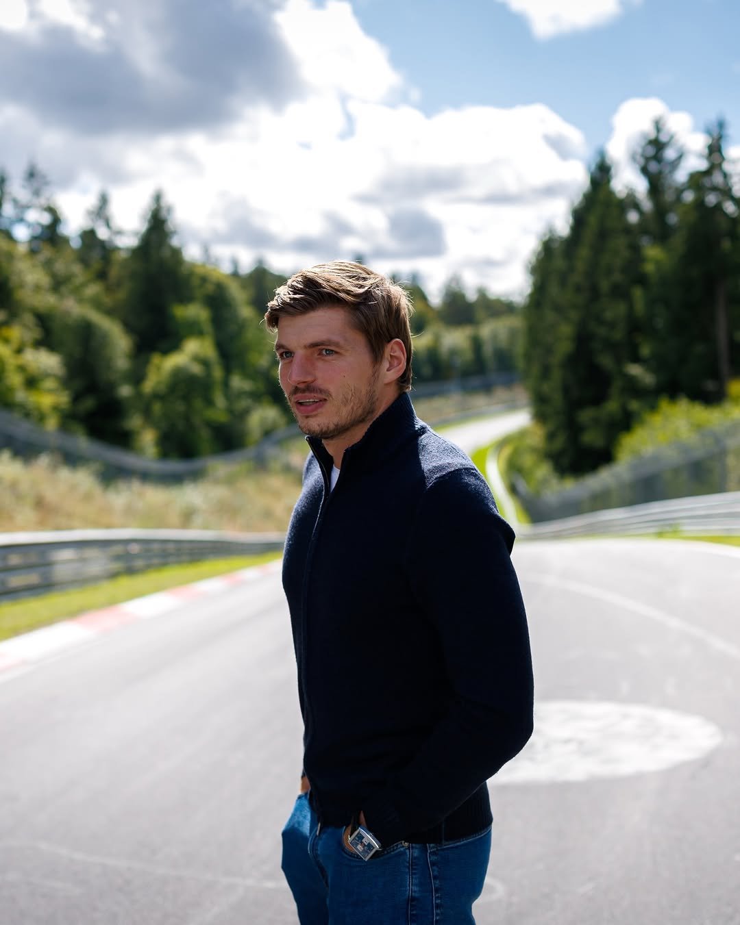 Photo by Max Verstappen on February 24, 2026. May be an image of one or more people, people racing vehicles, road and text.