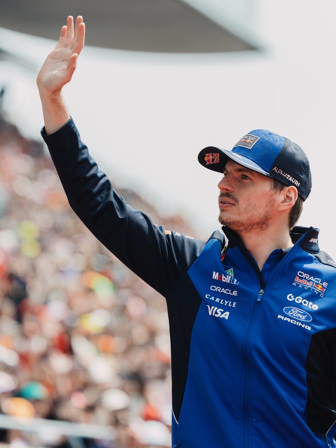 Photo by Max Verstappen on March 29, 2026. May be an image of racing vehicles, helmet and text.