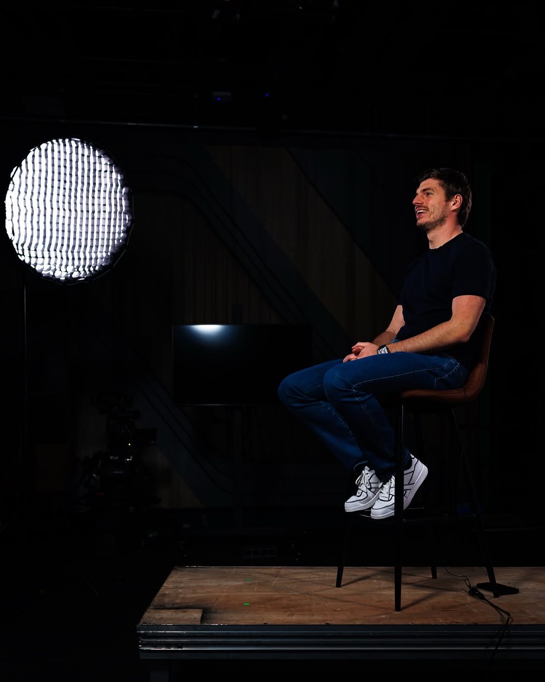 Photo by Max Verstappen on March 10, 2026. May be an image of lighting, microphone and text.