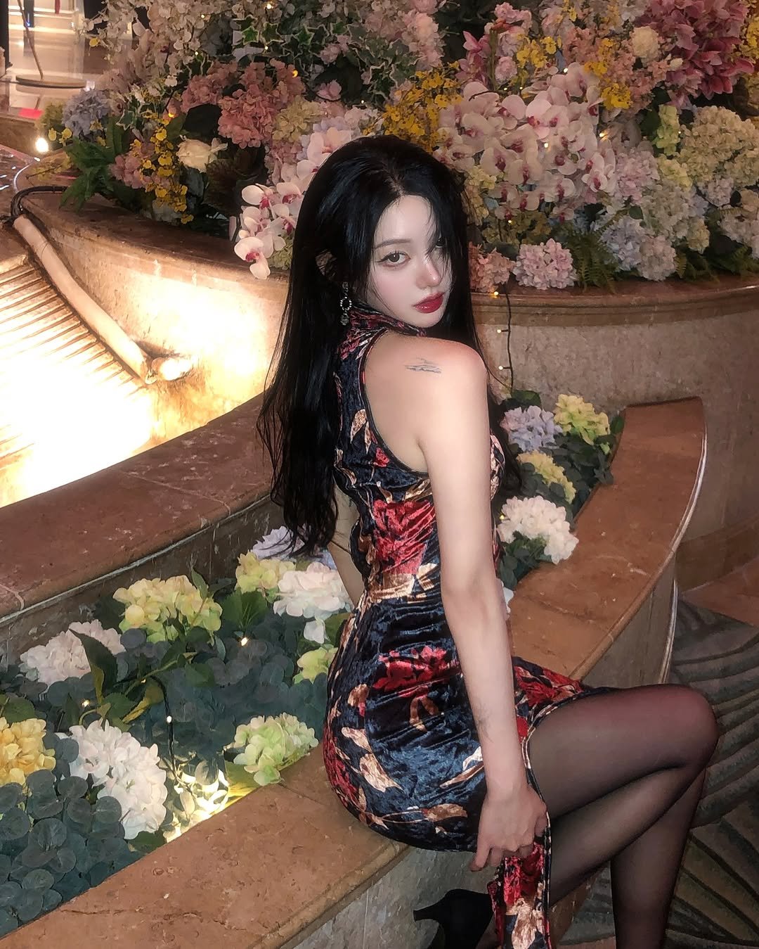 Photo by 메이뮤 maymew on April 24, 2025. May be an image of 1 person, fishnet stockings and text.