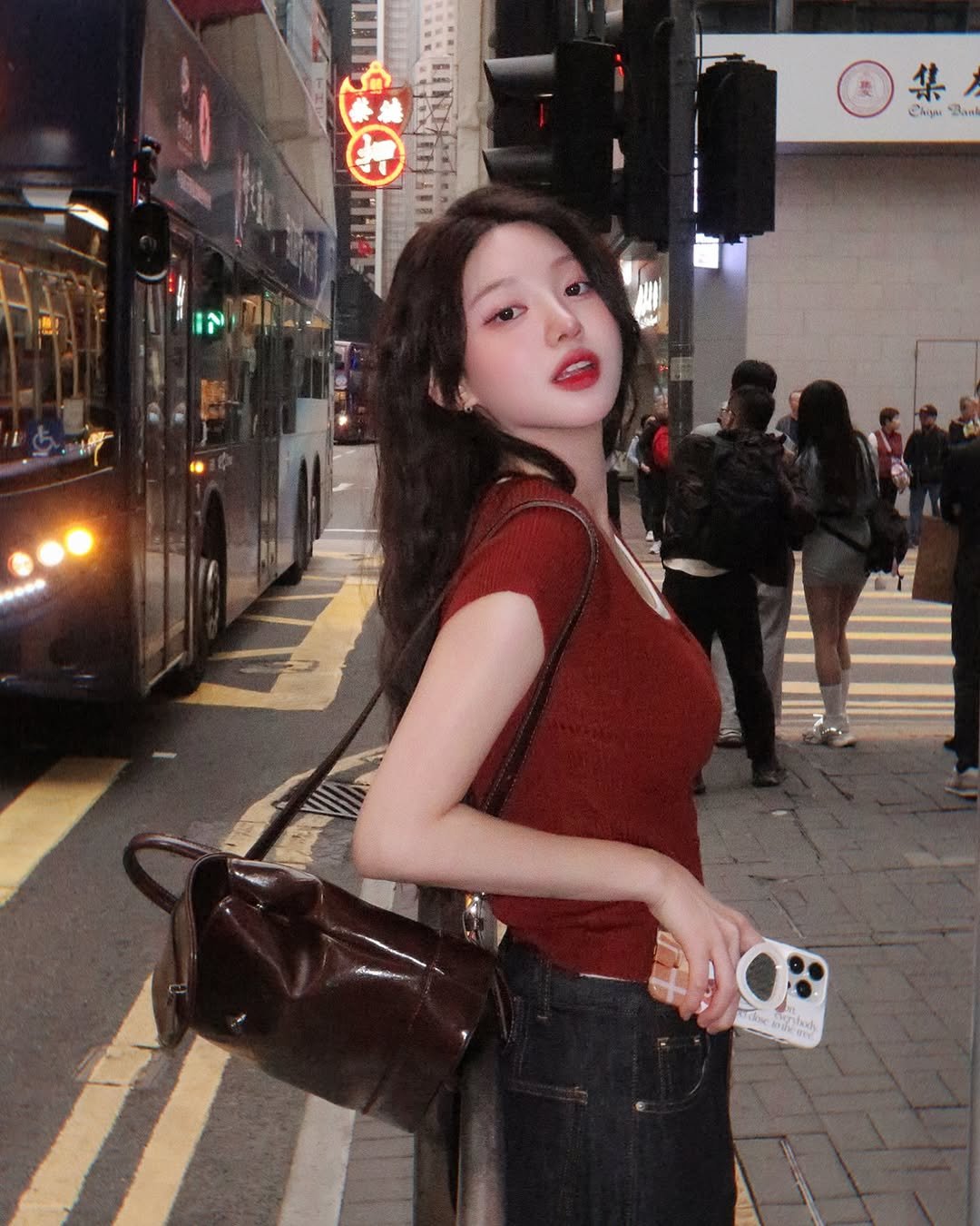 Photo by 메이뮤 maymew on April 27, 2025. May be an image of 5 people, hair, bus, street and text.