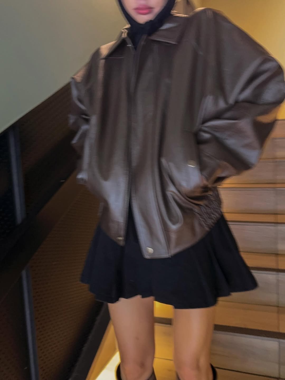 Photo by 메이메이 / maymay on October 01, 2025. May be an image of 1 person, overcoat, duffle coat, flight jacket, raincoat, miniskirt, parka and text.