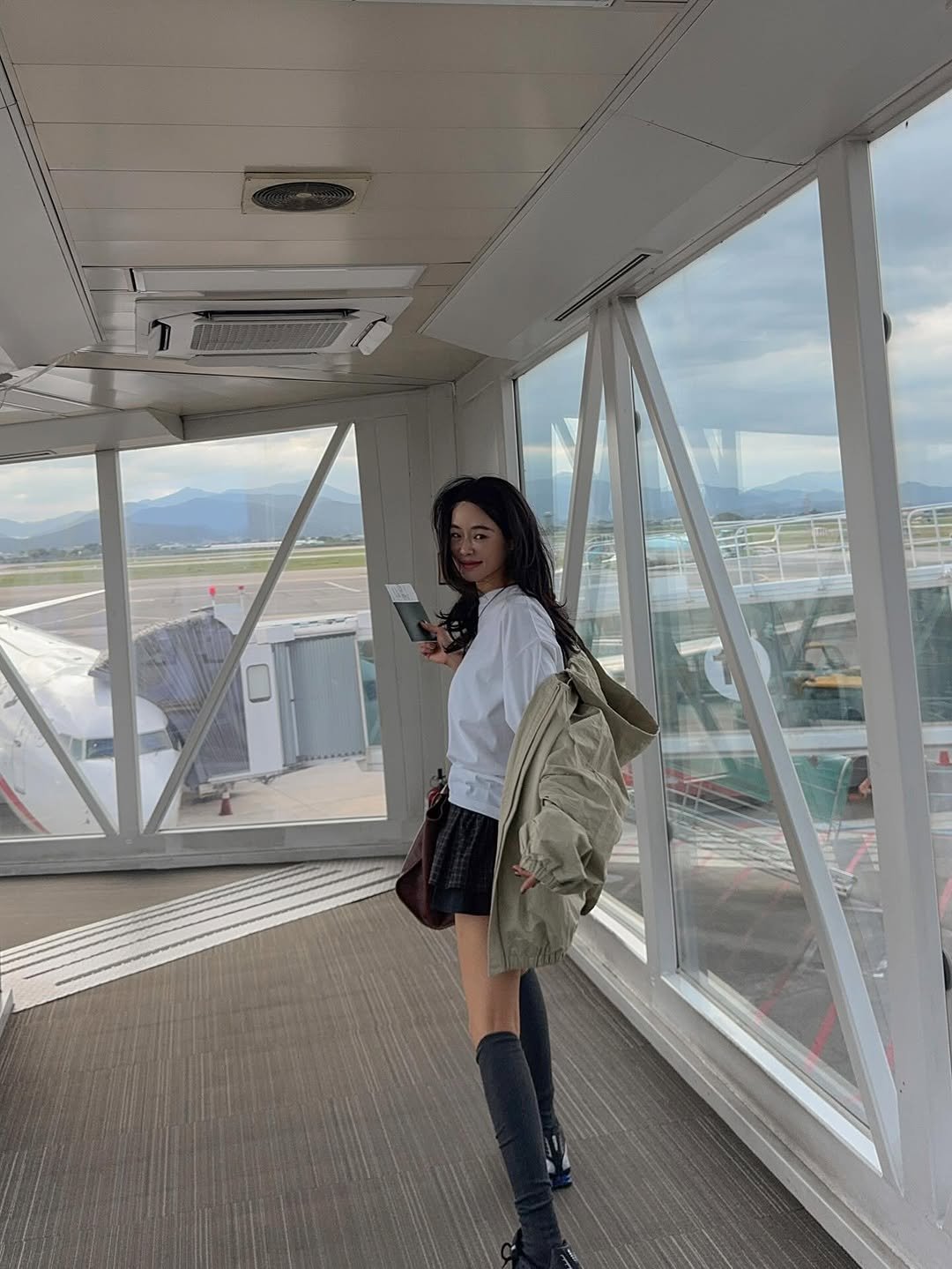 Photo by 메이메이 / maymay on September 30, 2025. May be an image of 1 person, airplane and text.