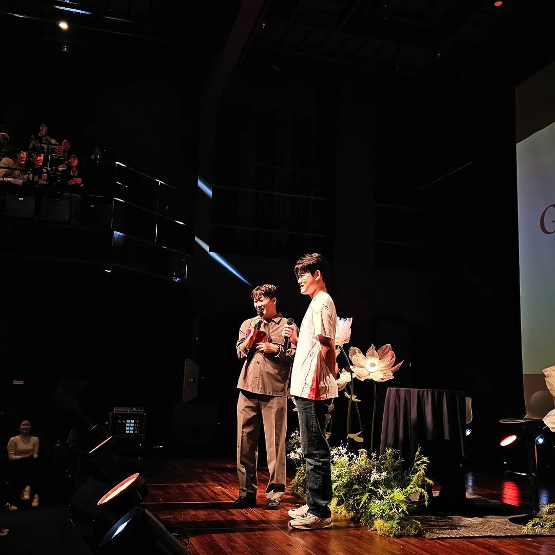 Photo by MC성민 (MC 사회자) on November 27, 2025. May be an image of one or more people, fire, concert and text.